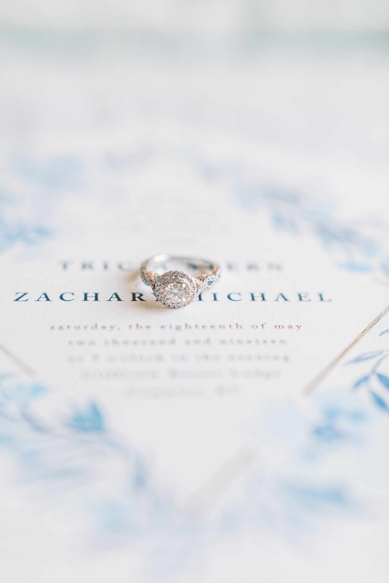 blue wedding invitation ring shot
